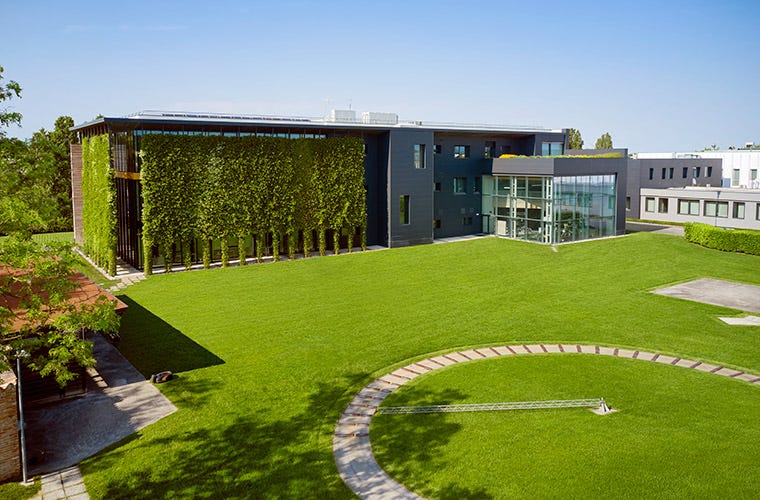 STIGA headquarter building with green grass outside