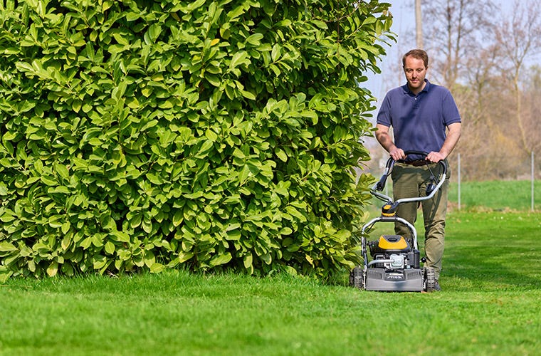 Petrol lawn mowers