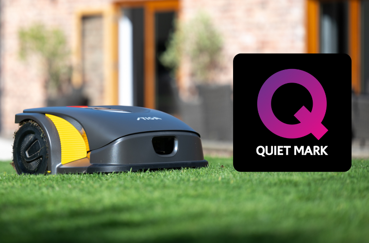 stiga grey robot mower on lawn
